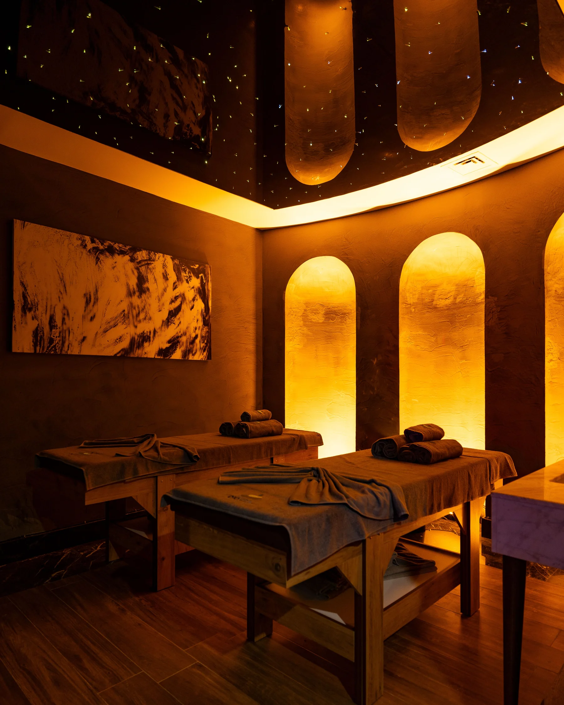 A softly lit spa treatment room